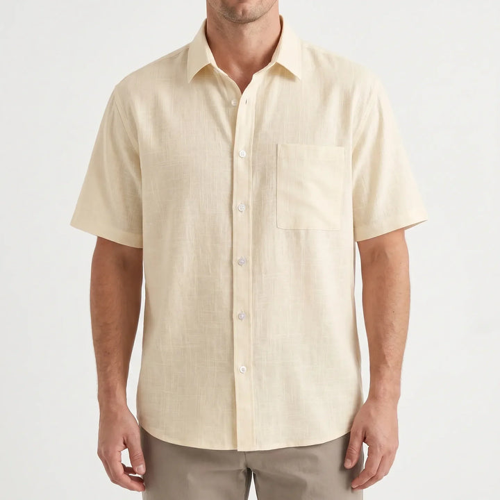 Versatile men's short-sleeve button-up shirt for casual wear, ideal for vacation style & daytime leisure.
