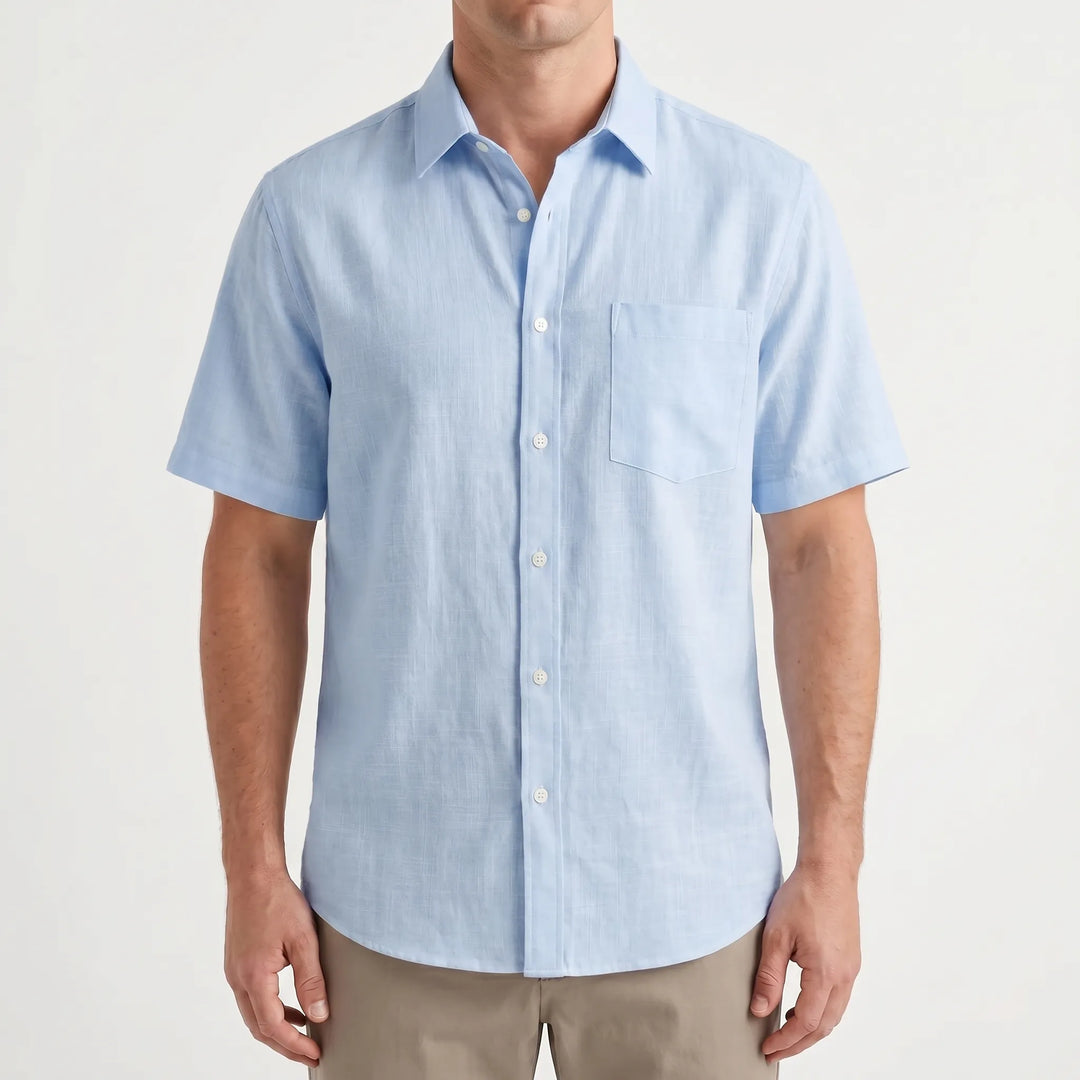 Stylish men's short-sleeve button-up shirt for casual outings, offering comfort & a relaxed fit for warm days.