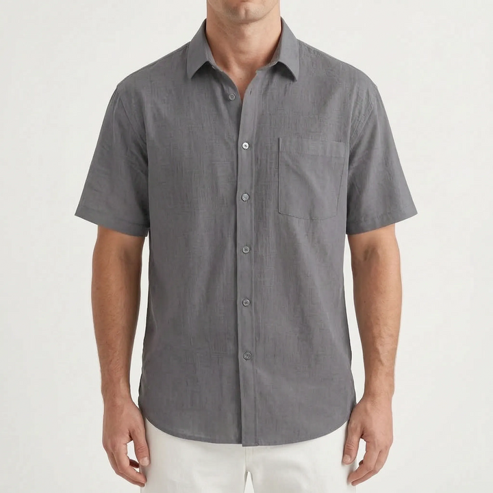 Everyday men's short-sleeve button-up top, a comfortable solid color shirt for casual summer and leisure.