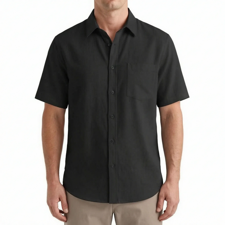 Casual men's short-sleeve shirt, button-up style for relaxed summer wear, versatile for daytime and vacations.