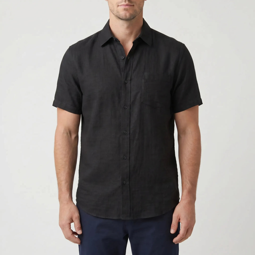Lightweight men's button-down shirt, short sleeve & relaxed fit. Ideal for warm weather casual style.
