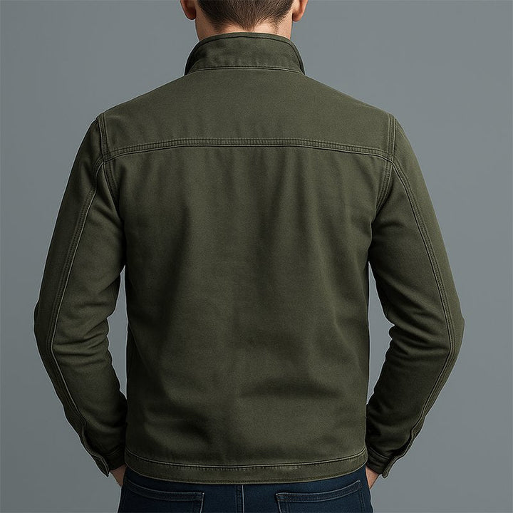 Detailed view of a men's classic all-season utility jacket, highlighting its durable fabric & stylish features.