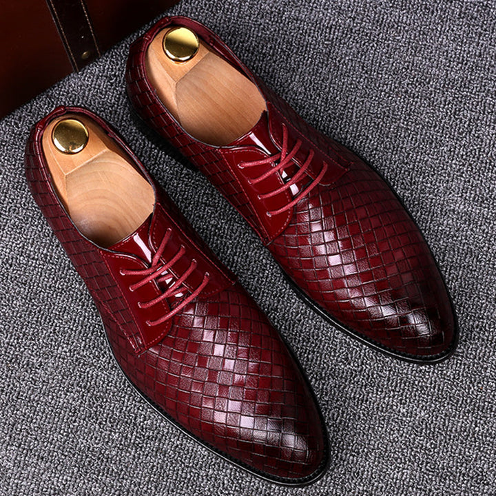 Men's classic black leather lace-up dress shoes, perfect for formal occasions & business attire. Elegant & comfortable.