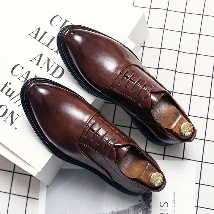 Men's classic black oxford dress shoes, perfect for formal business, wedding, and professional office wear.