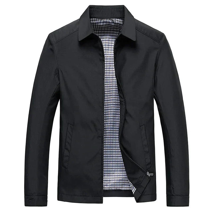 Men's classic black zip-up jacket with subtle checked lining, perfect for versatile smart-casual outerwear.