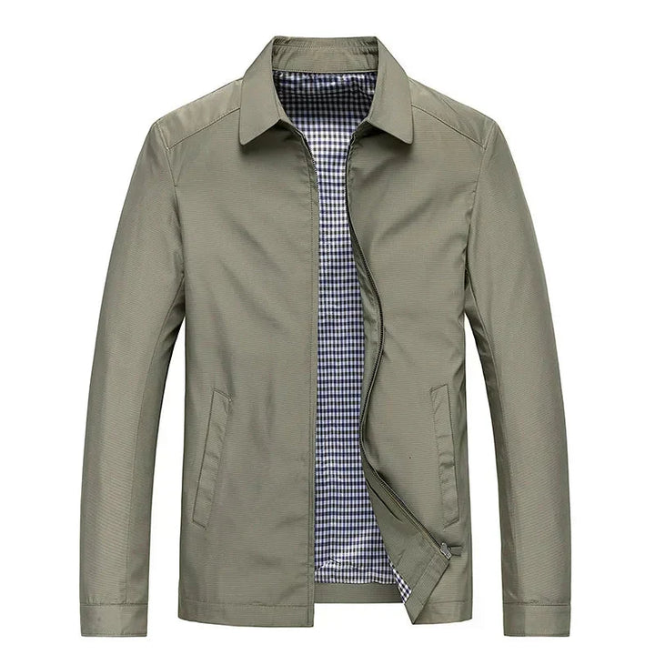 Man wearing a classic zip-up jacket, showcasing its comfortable fit & stylish checked lining for everyday wear.