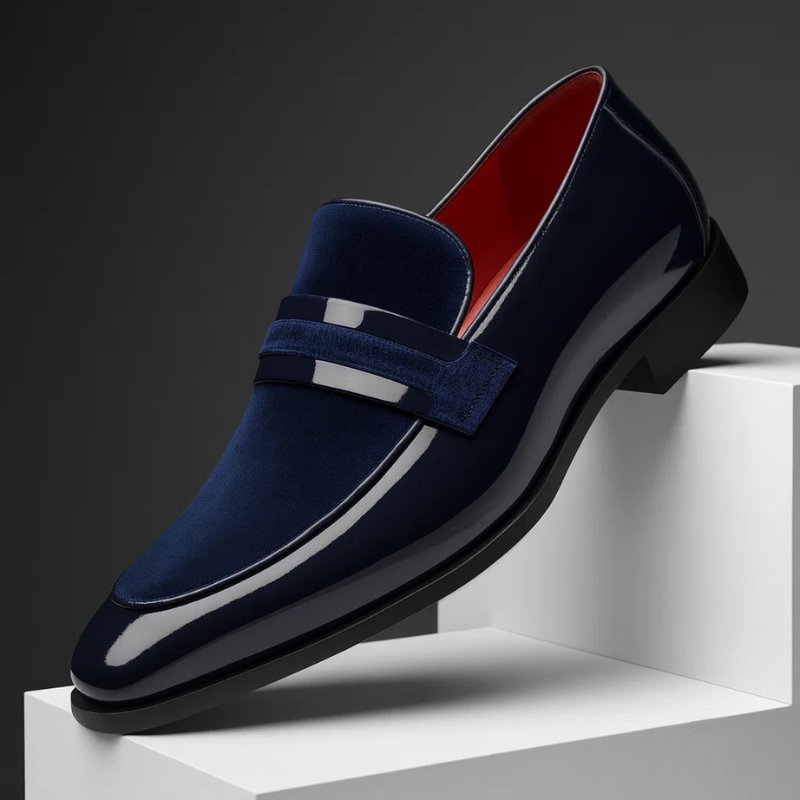Men's classic brown leather penny loafers, perfect slip-on dress shoes for smart casual and formal outfits.