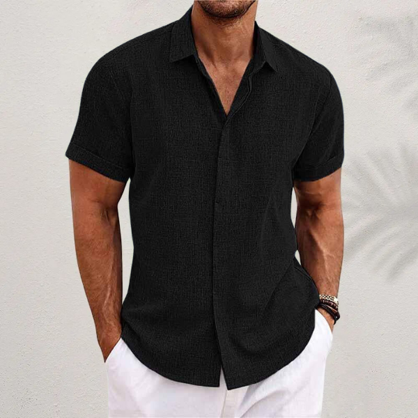 Relaxed fit men's short sleeve button shirt with a classic collar, ideal for casual and warm weather fashion.