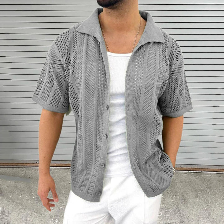 Comfortable & breathable men's knit shirt, classic collar, short sleeve for relaxed summer fashion.