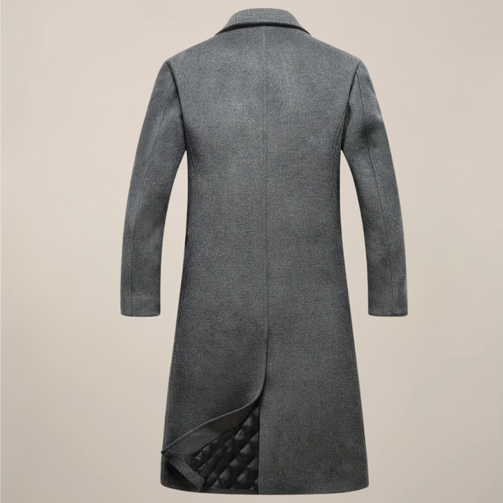 Stylish man wearing a tailored long overcoat for men, ideal for cold weather fall and winter outfits.