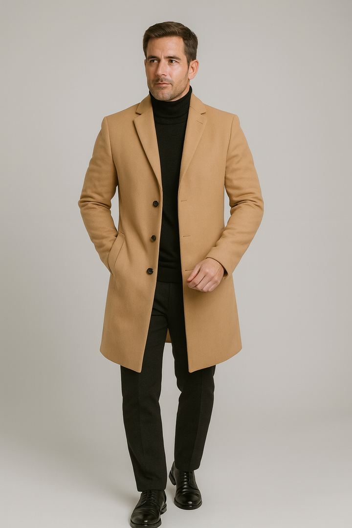 Man wearing an elegant long trench coat, classic overcoat with notch lapel. Stylish men's fashion outerwear.