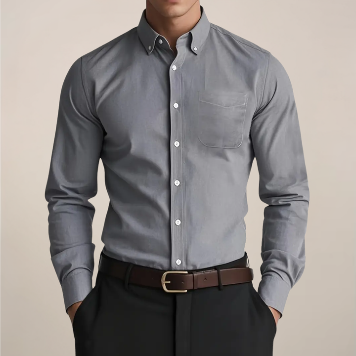 Stylish men's long sleeve button-up shirt. Classic design for versatile fashion, suitable for office & casual looks.