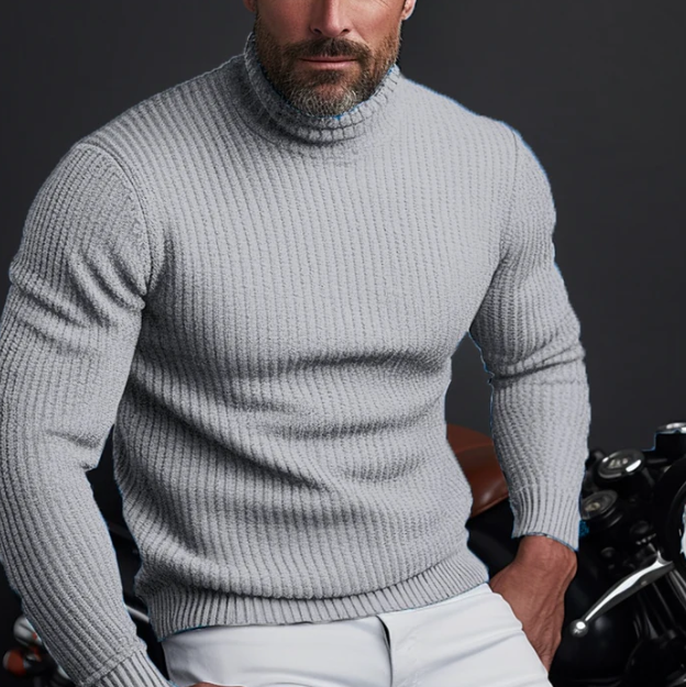 Stylish men's warm ribbed turtleneck sweater. A slim fit long sleeve knit ideal for formal or casual winter layering.
