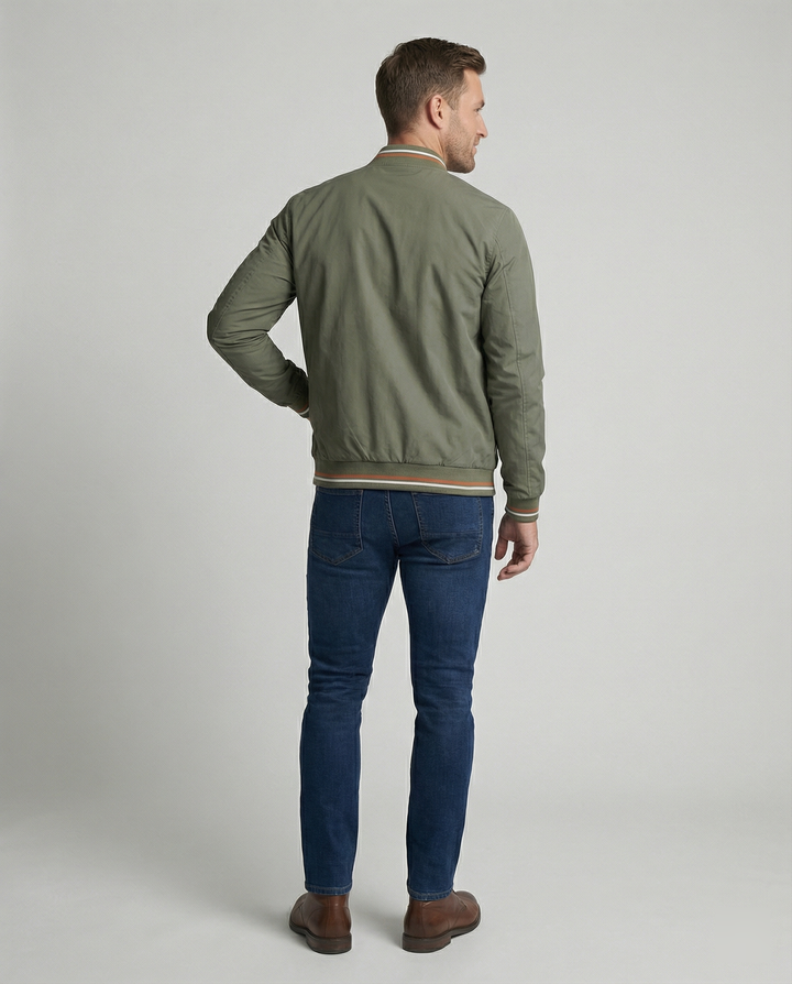 Versatile men's bomber jacket for fall and spring fashion, featuring classic ribbed trim and zipper.
