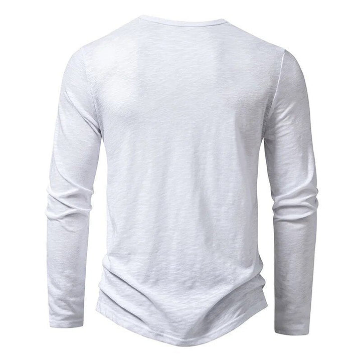 Black men's slim fit long sleeve Henley top, perfect for modern casual everyday style.