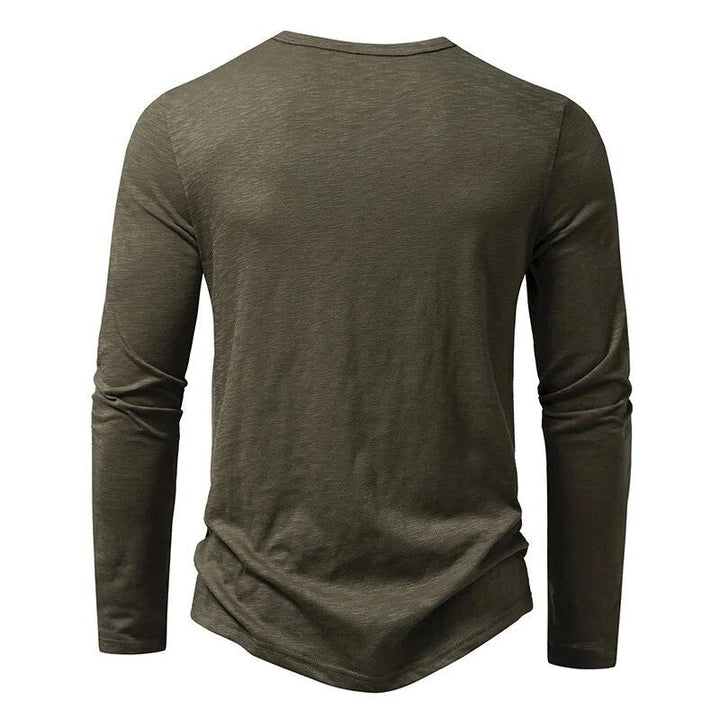 Men's slim fit long sleeve Henley in beige, showcasing its comfortable everyday style.
