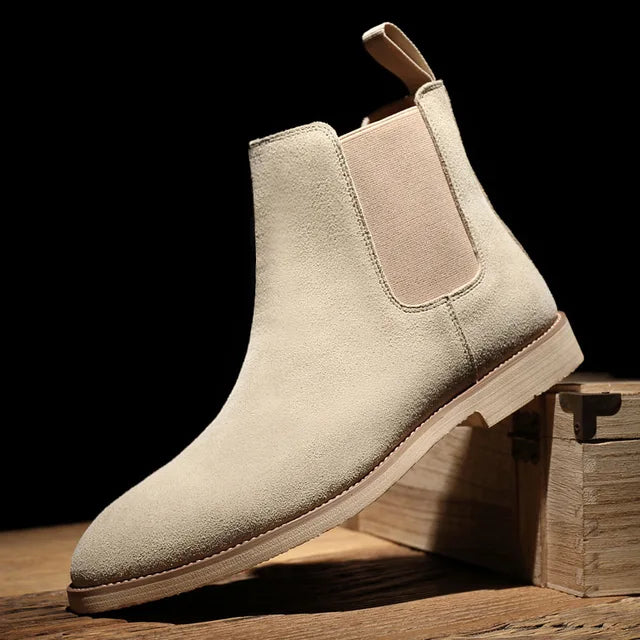 Side view of comfortable men's slip-on Chelsea boots with elastic sides, ideal for easy wear.
