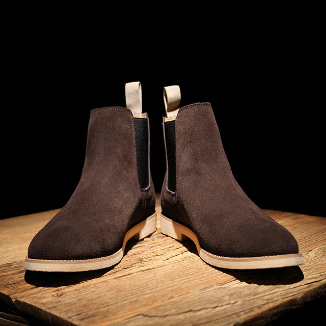Durable men's slip-on Chelsea boots, a classic ankle boot style for modern men's fashion.