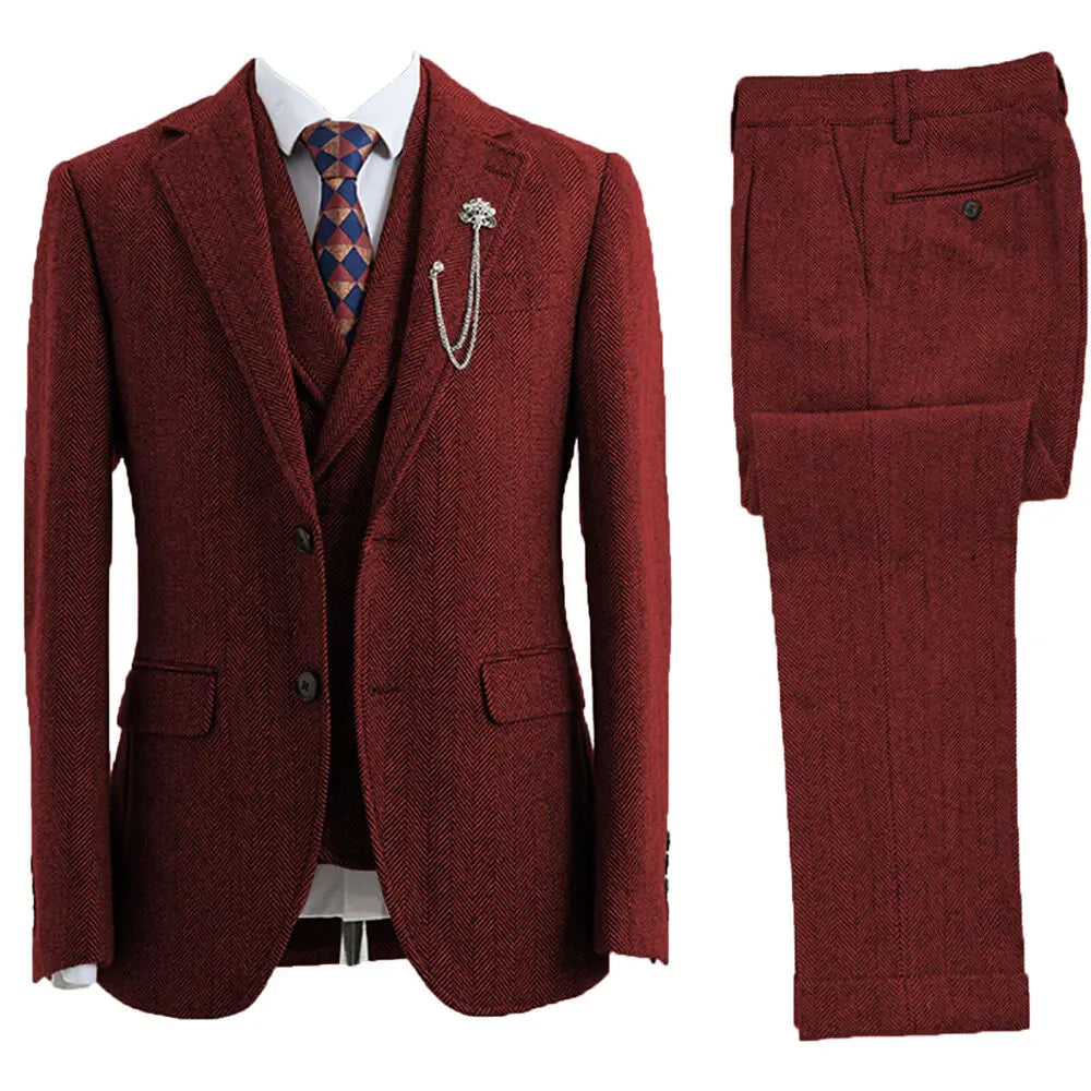 Back view of a men's tailored fit 3-piece herringbone suit, highlighting the impeccable cut and classic style.