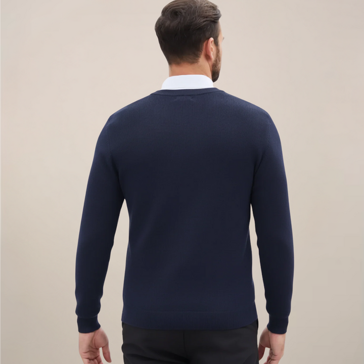 Elegant men's long-sleeve V-neck pullover sweater. Comfortable, refined style for everyday wear.