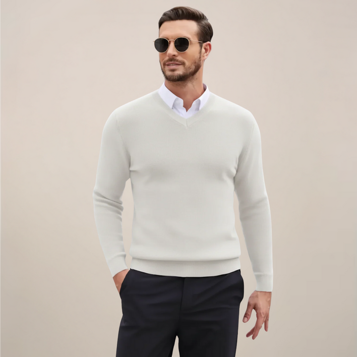 Comfortable men's classic V-neck sweater. Pullover design with long sleeves for fall/winter warmth.