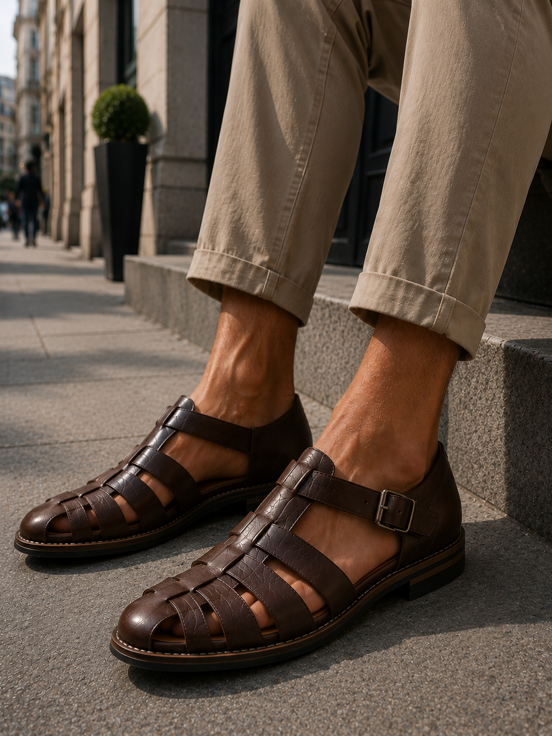 Classic men's fisherman sandals featuring a protective closed-toe and adjustable buckle strap.