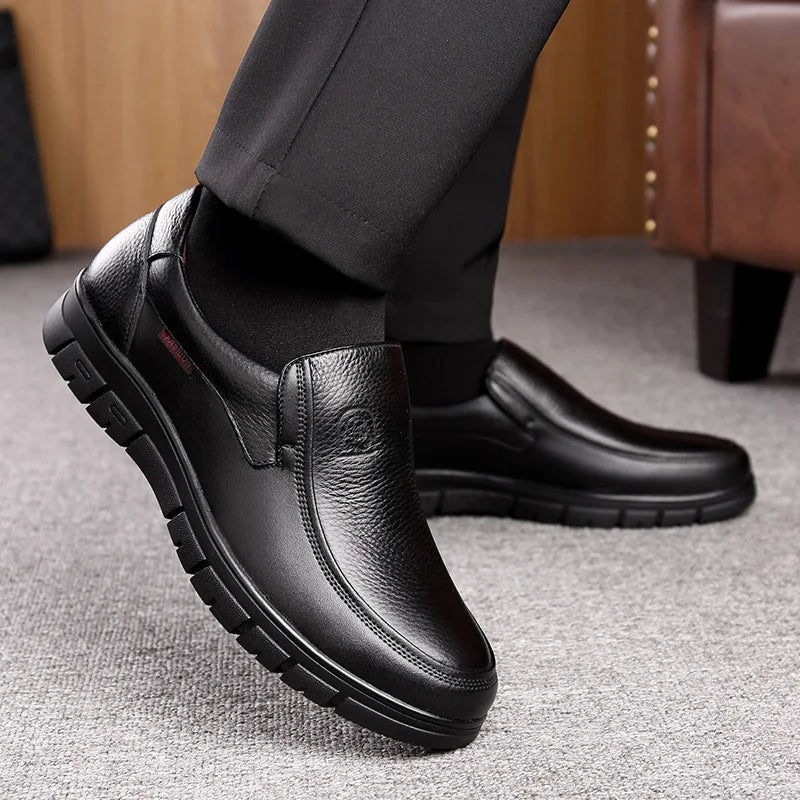 Versatile brown men's slip-on loafers, offering everyday comfort and classic style.