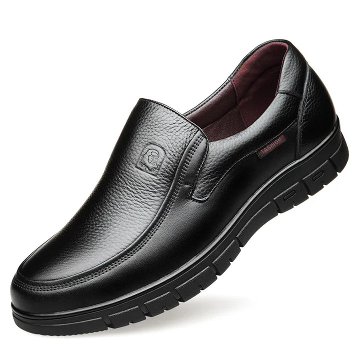 Step into comfort with men's black slip-on loafers, ideal casual footwear for daily wear.