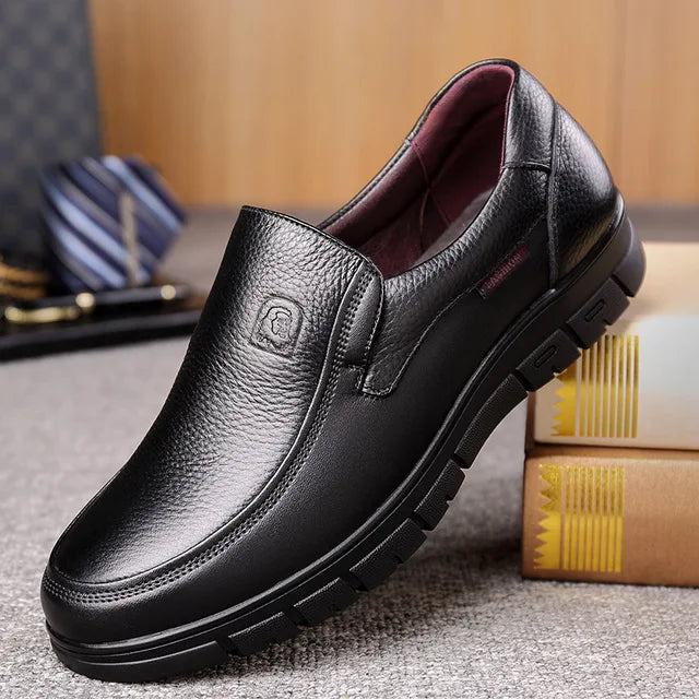 Classic brown men's slip-on loafers, versatile casual footwear for everyday fashion.