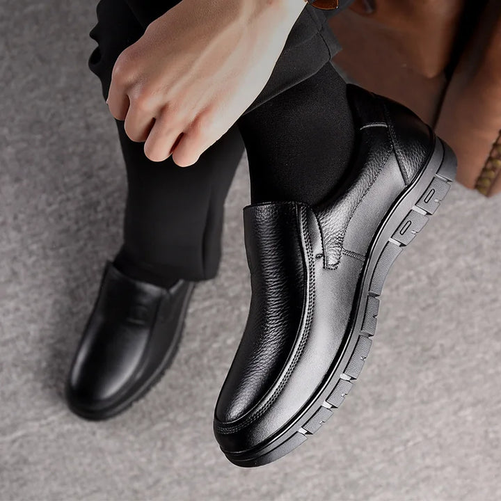 Fashionable men's brown slip-on loafers, comfortable and versatile footwear for daily casual wear.