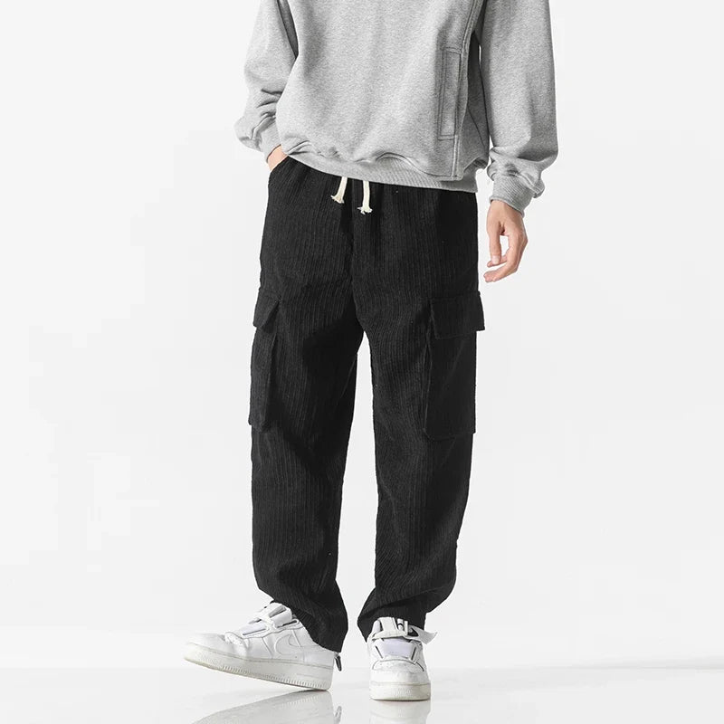 Stylish men's cargo pants with a comfortable drawstring waist, perfect for relaxed fashion.