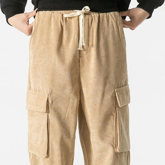 Comfortable men's relaxed fit cargo pants, modern style with a functional drawstring waist.