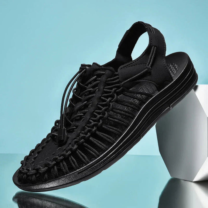 Men's comfortable closed-toe sandals with adjustable fit, ideal for outdoor adventures & walking.