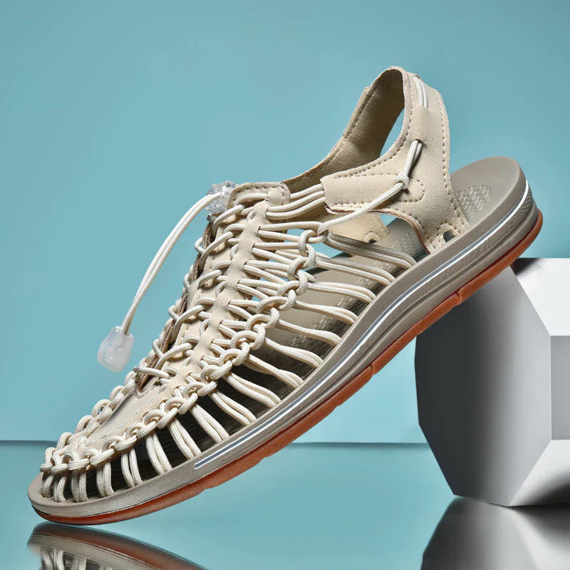 Grey men's casual closed-toe sandals with adjustable straps, providing comfortable summer footwear.