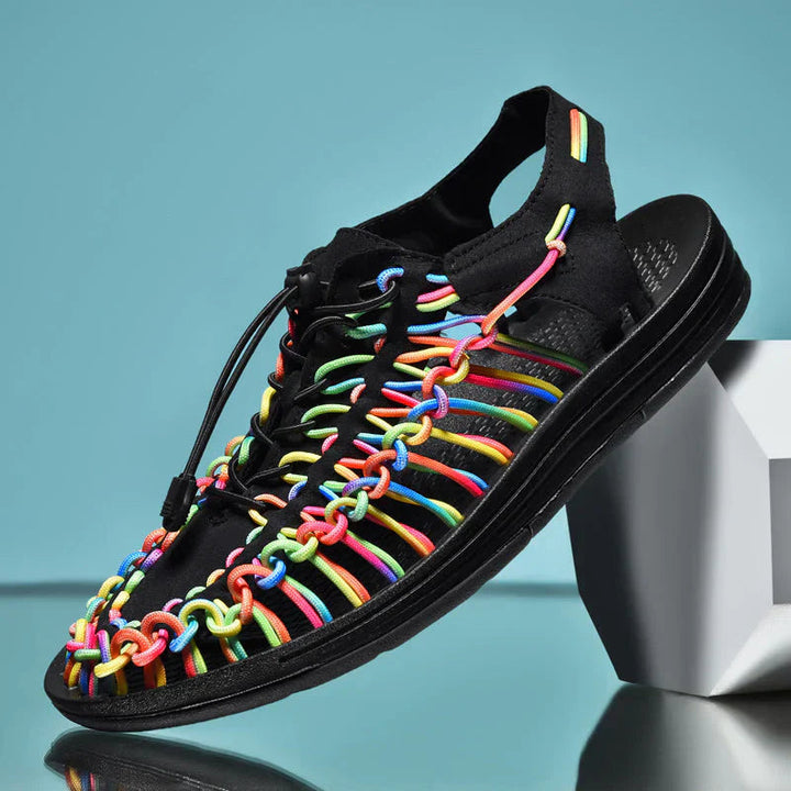 Black men's casual closed-toe sandals, offering comfortable support for walking & beachwear.