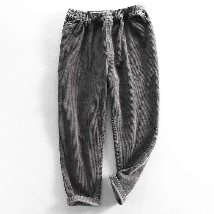 Stylish men's corduroy pants, ideal for fall & winter fashion. Comfortable stretch fabric, solid color, versatile casual wear.