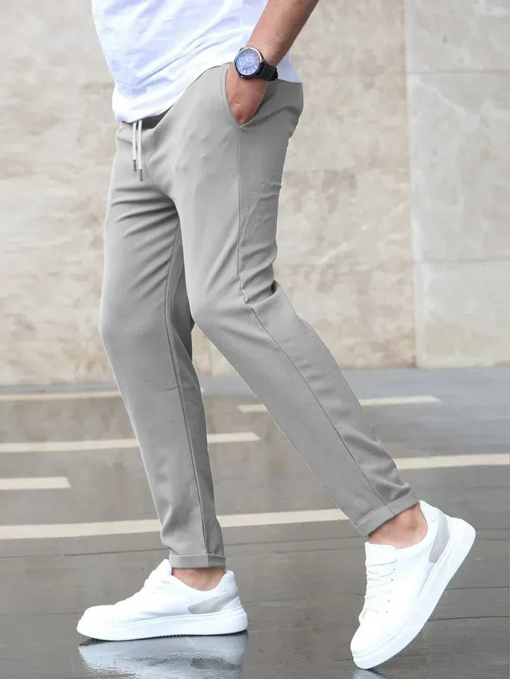 Back view of men's comfortable chino pants with drawstring, stylish and versatile for men.