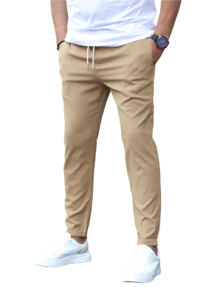 Man wearing modern fit drawstring chino pants for a relaxed, comfortable casual look.