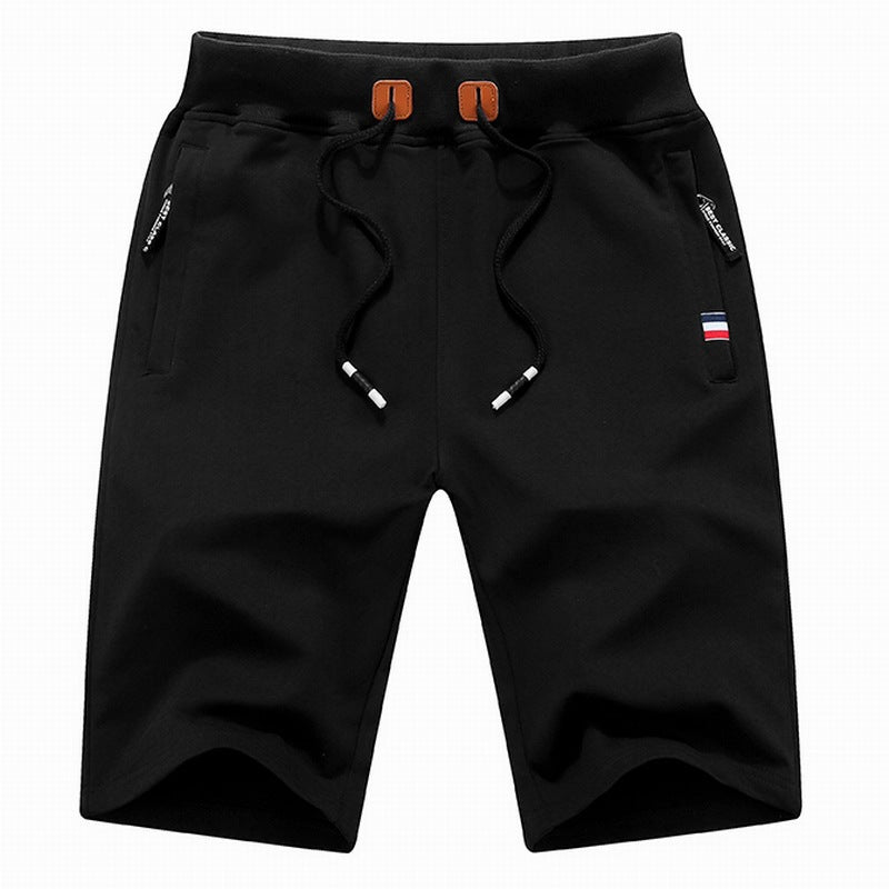 Drawstring casual shorts for men, featuring zippered pockets, great for summer activities or loungewear.