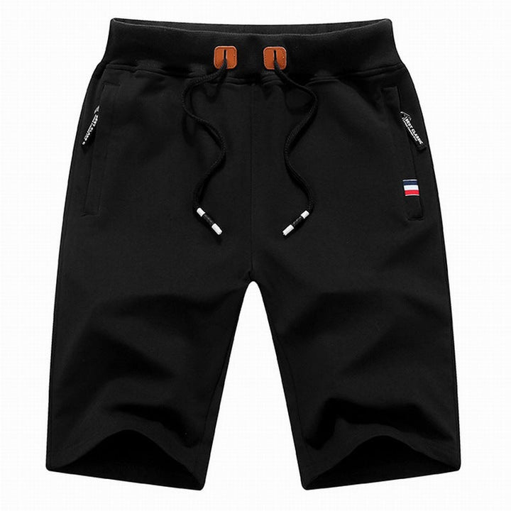 Drawstring casual shorts for men, featuring zippered pockets, great for summer activities or loungewear.