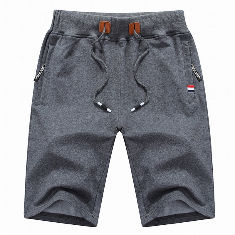 Stylish men's comfortable drawstring shorts, versatile for casual wear, beach, or light workouts.