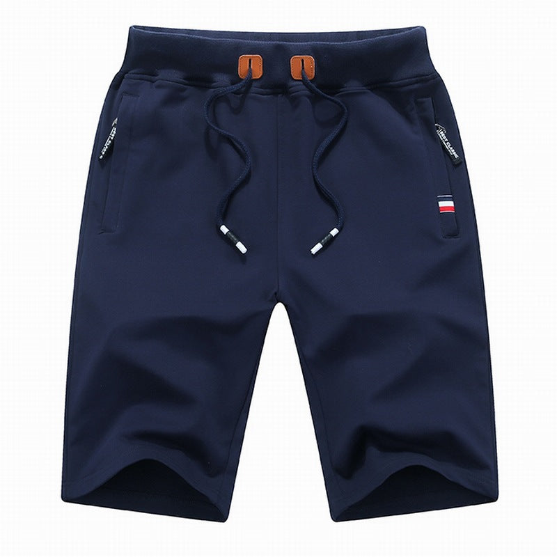 Comfortable men's drawstring active shorts. Ideal for casual, gym, or summer wear with zippered pockets.