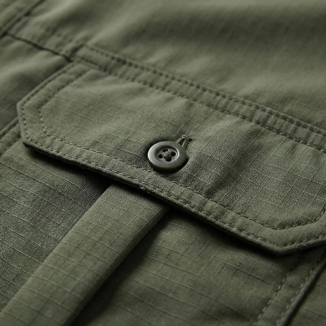 Man hiking in a durable, quick-dry convertible outdoor shirt with zip-off sleeves.