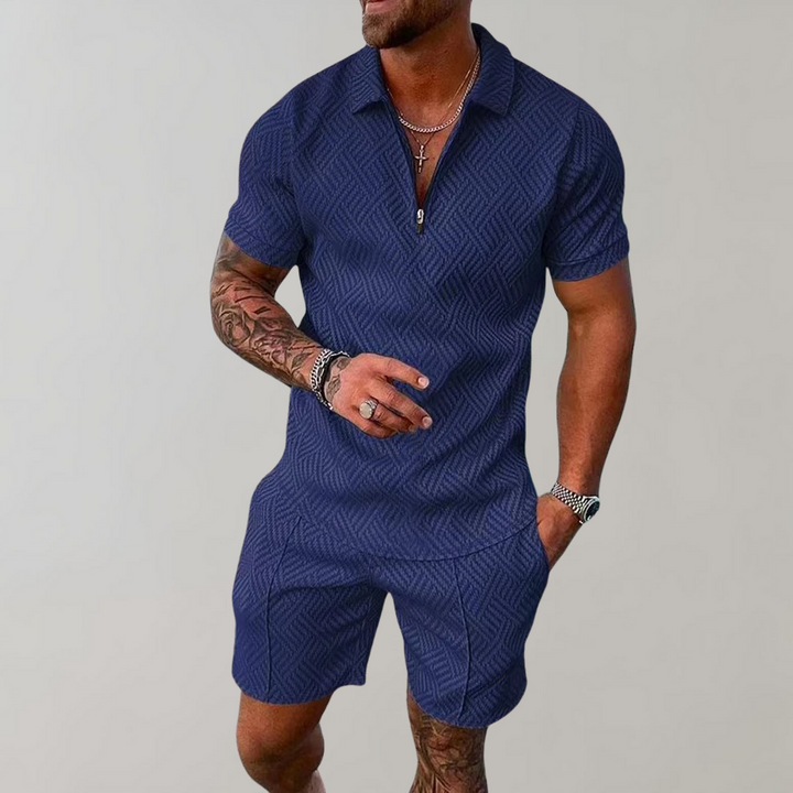 Casual men's summer two-piece set: matching zip collar polo shirt & comfortable textured shorts for warm weather.