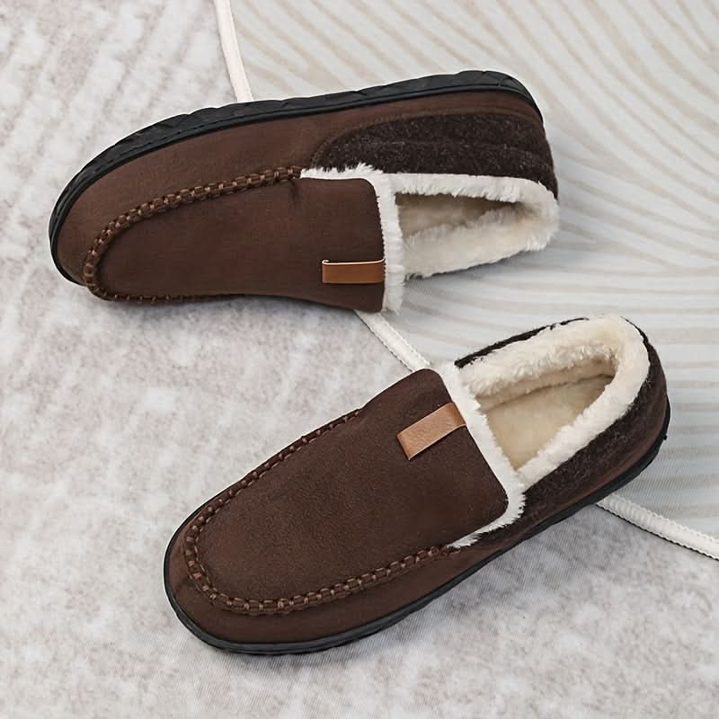 Men's cozy house slippers, loafer style, for warmth and comfort at home.