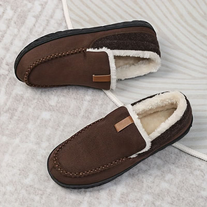 Men's cozy house slippers, loafer style, for warmth and comfort at home.