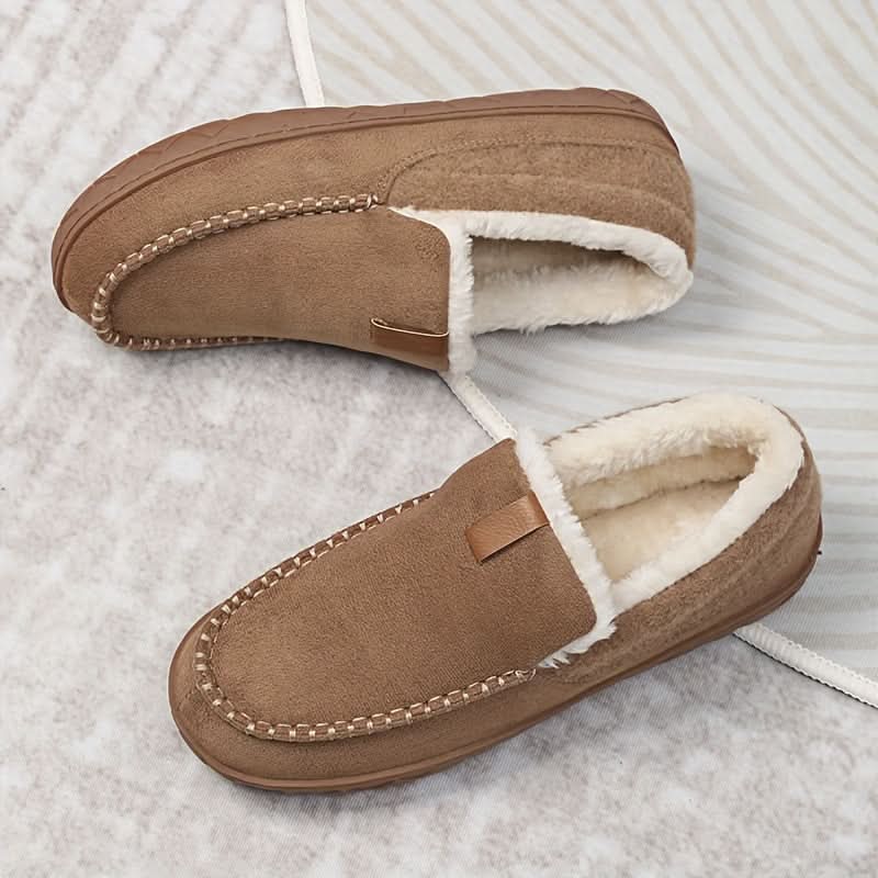 Comfortable slip-on men's indoor shoes, ideal for winter and home lounging.