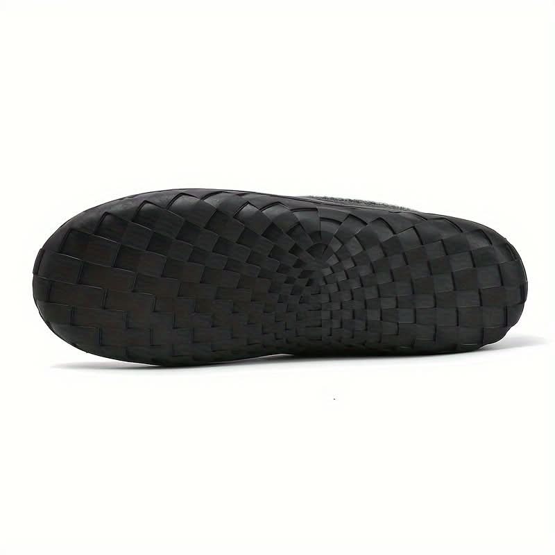 Stylish men's warm slip-on house shoes for cozy fall winter evenings.