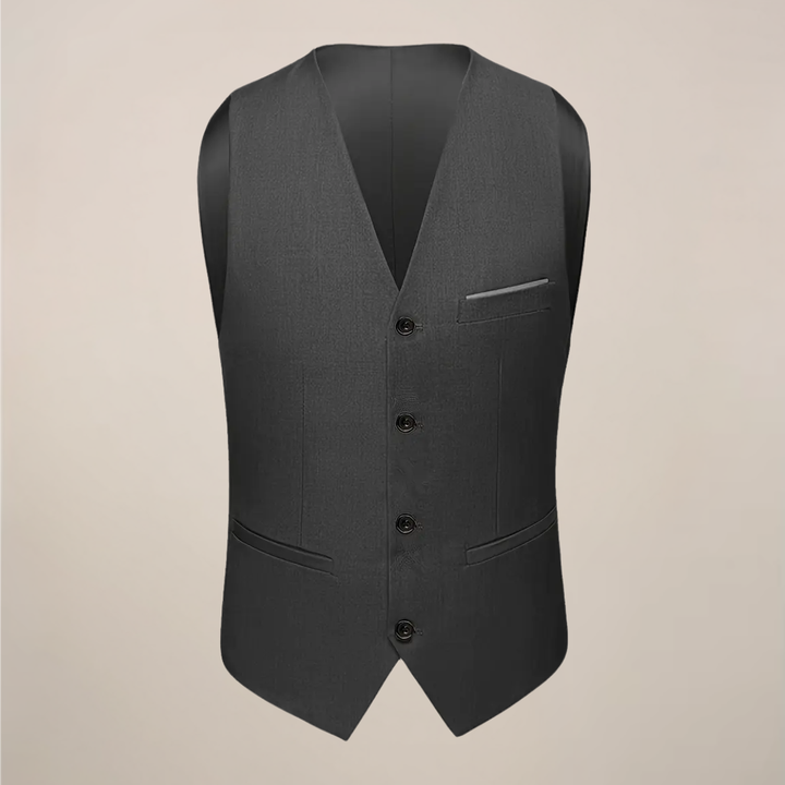 Professional men's dark grey three-piece suit, slim fit. A sophisticated choice for business meetings or wedding guest attire.