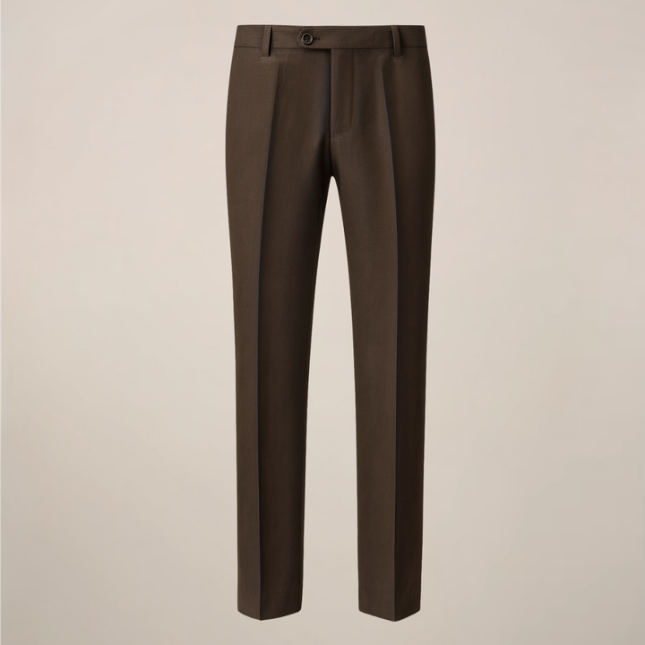 Tailored dark grey slim fit men's three-piece suit. Modern design for formal events, weddings, and professional business wear.
